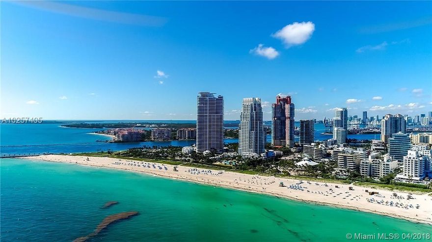 Spacious corner residence completed w highest quality craftsmanship. Located on the most unique floor offering an oversized terrace, enjoying sweeping views of the coastline, South Beach, bay & downtown Miami. Split bedroom plan each with a private balcony. Projection TV in Living and Master bedroom,Gourmet kitchen w Subzero, Miele Appliances.  Two wine coolers, oversized washer/dryer. Private Foyer entry, 10 FT ceilings with floor to ceiling glass. Continuum 5-star amenities include 24-hour security/valet, 3 tennis courts, private beach pavilion, 2 lagoon style pool, 23,000 SQFT sporting club & spa w Lap Pool.