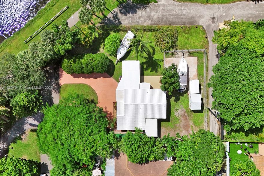 Welcome to your own slice of paradise with breathtaking views of the canal. This well-maintained home is surrounded by lush, beautiful landscaping, creating a serene and private setting. Inside, you’ll find a thoughtfully cared-for home with plenty of closet space and room to grow.
The property offers endless possibilities outdoors — with more than enough space to design the pool of your dreams. A huge round driveway welcomes you home and provides abundant parking, while additional space is perfect for accommodating boats, RVs, or guests.
Nestled in a quiet, relaxing area, makes this home perfect for those who want to enjoy both tranquility and convenience.
Don’t miss your chance to make this water view retreat your own! Close proximity to houses of worship.