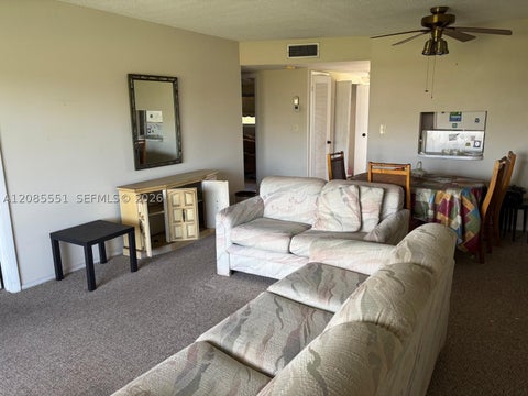 Photo of 8021 N Sunrise Lakes Dr #310, Sunrise, FL 33322 (MLS # A12085551)