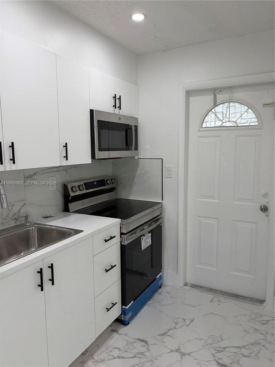 Completely remodeled duplex, located in a great safe area, surrounded by good schools, shops etc., New washer and dryer, two cars can be parked outside in front of house.