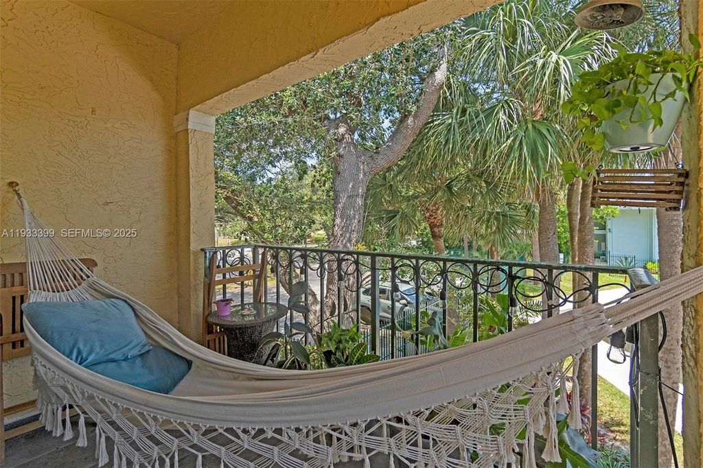 Photo of 1105 Lake Shore Dr #202, Lake Park, FL 33403 (MLS # A11933399)