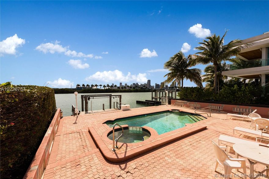 An incredible opportunity on PALM ISLAND WATERFRONT WITH A DOWNTOWN MIAMI SKYLINE VIEW! 
Existing 1962 home with unique modern detail and artistic flair. 3 bedroom, 3 bath pool home plus dock, with floor-to-ceiling windows offering great water views. In need of renovation, add on, or tear down, but don't miss out! Live on one of Miami Beach's most sought-after guarded communities.