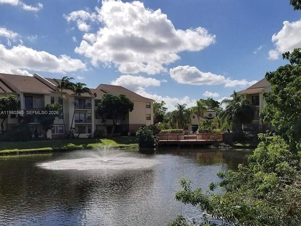 Photo of 9999 Summerbreeze Dr #505, Sunrise, FL 33322 (MLS # A11980360)