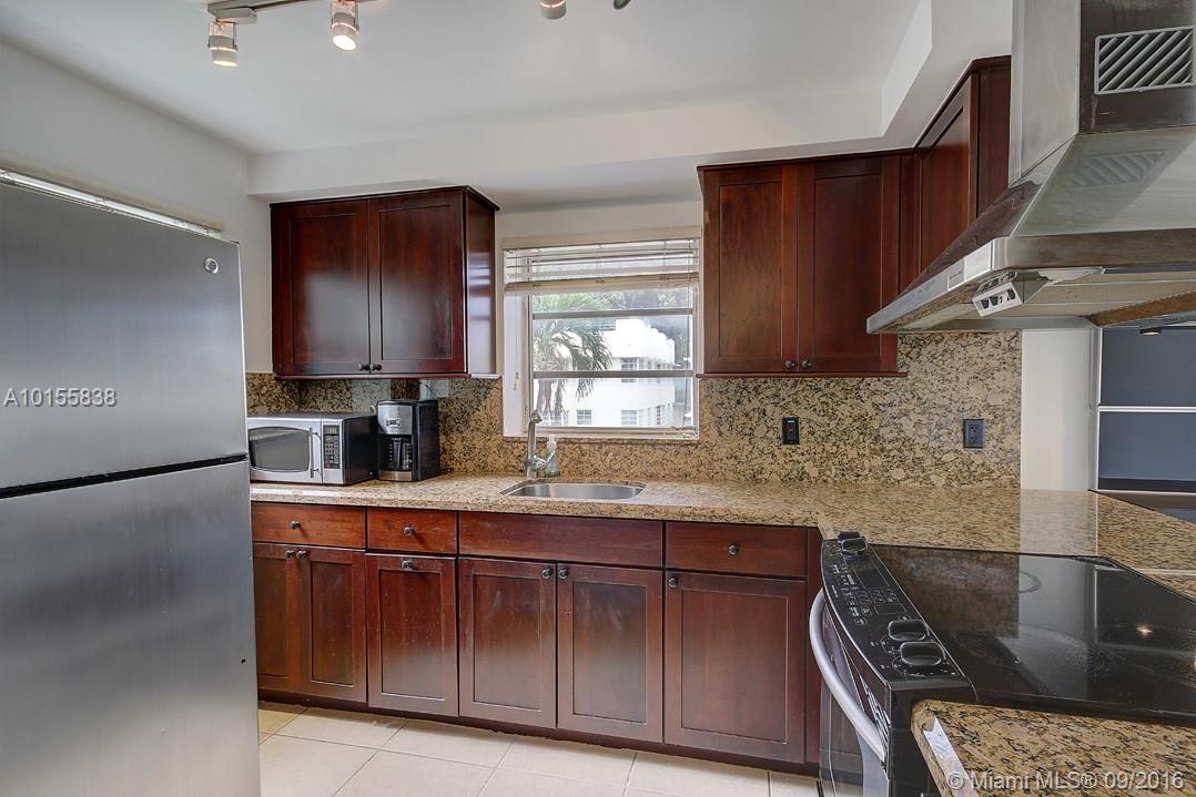 Hurry! Renovated 1/1.5, corner unit w/ covered parking, balcony & lots of light! Open kitchen features granite counter tops, wood cabinetry, SS appliances, & dishwasher. Enter master bedroom through French doors & enjoy a walk- in closet & master bath with 5-spout shower. Washer/dryer in unit! Small Pets allowed w/ approval. Walking distance to the beach, Lincoln Rd, Flamingo Park/Pool/Tennis Courts. Non-Smokers only. 6 month rental only.