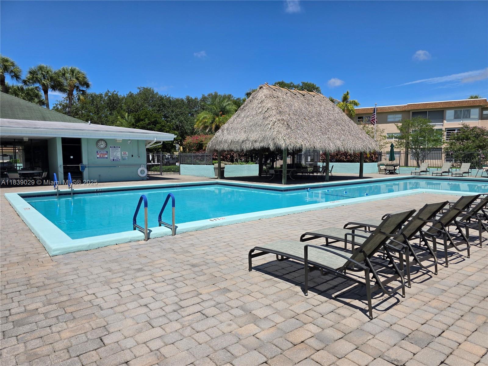 55+ Fantastic opportunity to own a 2 bed, 2 bath corner villa in the desirable 55+ community of Natura! This original condition home is ready for your personal touch — perfect for investors or buyers looking to renovate and create their ideal space. The screened-in porch offers the perfect spot to relax and enjoy Florida living. Conveniently located just minutes from the beach, shopping, dining, and major highways. Community amenities include a pool, clubhouse, fitness center, and walking paths. Low HOA fee covers lawn care, water, roof maintenance and more. Priced to sell! Easy to show!