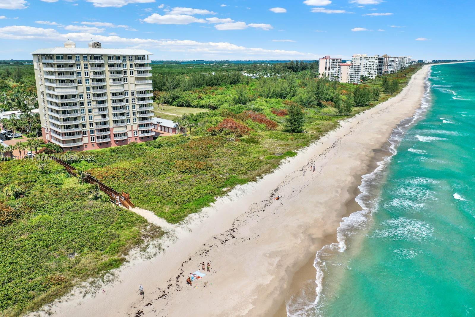 Exclusive and elegant oceanfront corner apartment with breathtaking views of the Atlantic ocean. Sit on the wraparound balcony and relax having lunch or dinner while looking at the waves crushing at the shore from this 7th floor perfect height unit. Unobstructed views from all 3 balconies with no adjacent buildings. Marble floors throughout. Four bedrooms and three and a half bathrooms. The fourth bedroom has closet, custom made privacy curtains and balcony, making it a perfect multi use room.Modern remodeled kitchen with brand new appliances, custom made quartzite countertop and spacious custom island. The Grand Isle Building stands out as a gem in North Hutchinson Island. W/ only 49 units, an Old Florida style lobby, lush landscape and a serene atmosphere.