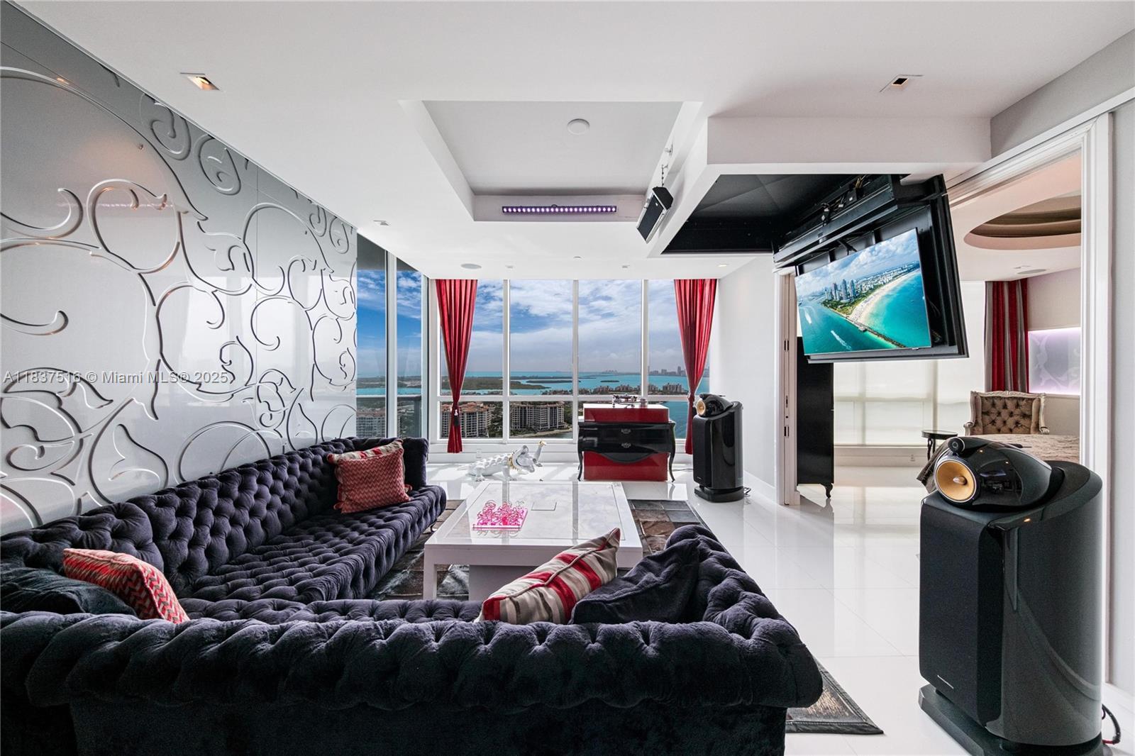 Sky-high elegance at Continuum South Beach. Located on the coveted 30th floor, this rarely available 2-bedroom, 2.5-bath residence offers unobstructed panoramic views spanning the Atlantic Ocean, Fisher Island, and the iconic Downtown Miami skyline. Floor-to-ceiling glass opens to a private terrace framing sunrise-to-sunset vistas. Unit 3002 has been enhanced with bespoke upgrades, including custom onyx features, a spa-style jacuzzi, and dual rain showers. Clean lines and refined finishes carry throughout the space. Residents enjoy private beach service, a world-class spa, state-of-the-art fitness center, valet, and dedicated concierge. Offered fully furnished.