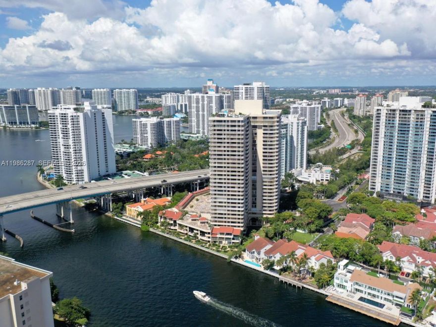 Experience living in this spacious 1990 sq. ft. 2-bedroom, 2.5-bathroom condo. The primary bedroom contains floor-to-ceiling closets and an ensuite bathroom. The 2nd bedroom includes a roomy closet and full bathroom, serving as a guest bathroom. Additional flex space functions as an office/den/bedroom. The kitchen offers a breakfast area and laundry facilities. The floor plan combines an open layout for entertaining and dining. Located in the heart of Aventura, close to excellent schools, houses of worship, entertainment, and  Aventura Mall. Only minutes to the beach. The City of Aventura provides free transportation: Freebee, an electric car service, and an Express Shuttle Bus operating within Aventura boundaries. Conveniently located near all major highways.  Easy to show!