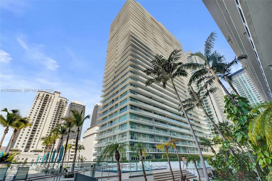 Corner unit at Axis North Tower in the heart of Brickell. This 2-bedroom, 2-bath residence features an open kitchen, in-unit washer and dryer, and a well-designed split floor plan that offers both comfort and privacy. Enjoy unobstructed west-facing views with stunning sunsets and abundant natural light throughout the day. The layout maximizes space and functionality, making it ideal for both end users and investors.

Axis offers resort-style amenities including a pool, fully equipped fitness center, business center, 24-hour concierge, valet, and security. Located in one of Brickell’s most desirable areas, just steps from Brickell City Centre, Mary Brickell Village, top restaurants, shops, nightlife, and public transportation. A perfect combination of location, lifestyle, and value in the heart of Miami’s financial district.