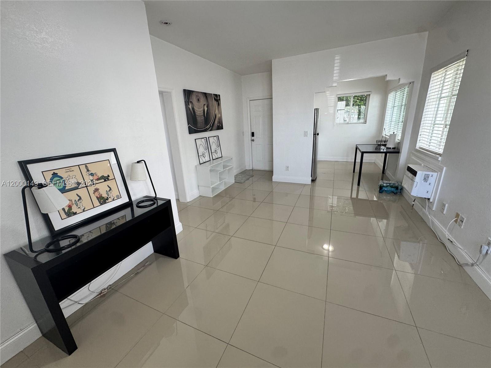 THE LOFTS AT COLLINS COND - Residential Lease