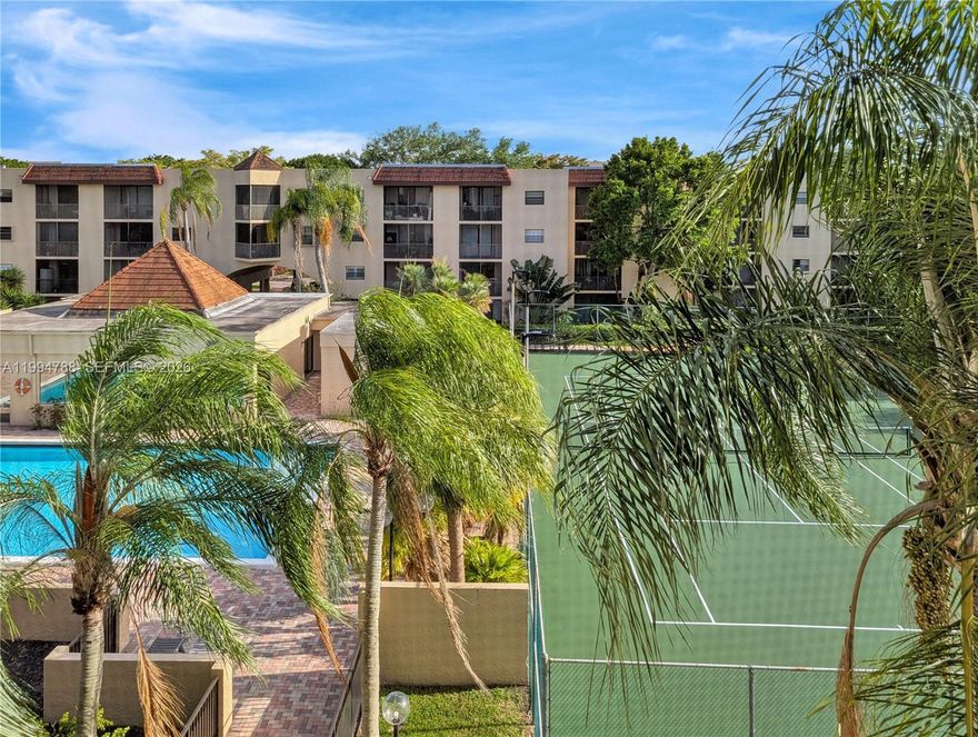 Rare opportunity to own the best-priced unit in Plantation Racquet Club - and it shows. Perched on the highest floor, this stunning 2BD/2BA condo delivers breathtaking sunsets, pool, and tennis court views from your private balcony. At 950 sqft, the layout is open, flowing, and surprisingly unique - nothing cookie-cutter here.

Inside, you'll find crown molding throughout, an abundance of natural light, generous closet space throughout, washer and dryer in the unit, and a private storage room - the details that make everyday living effortless. Every window is equipped with accordion shutters for full storm protection and peace of mind. The building itself is a standout: spa, pool, 4 tennis courts, ample parking, and private security on-site every night — all within a well-run association with HOA dues covering water and, best of all, FULLY FUNDED reserves.

Location is unbeatable. One block from American Heritage School, minutes to Sawgrass Mills, Central Park, University Drive, I-75, I-595, 20 minutes drive to FLL & beaches, and a full lineup of restaurants and shopping. Whether you're a first-time buyer, investor, or downsizing - this one checks every box. Move fast.