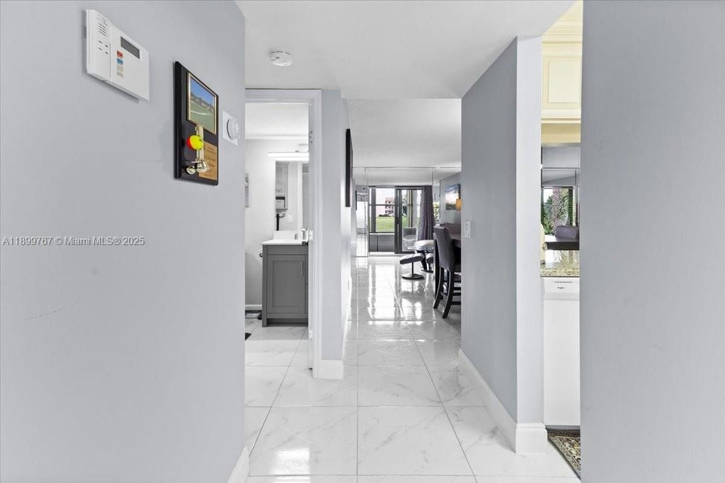 Photo of 10402 Sunrise Lakes Blvd #103, Sunrise, FL 33322 (MLS # A11899767)