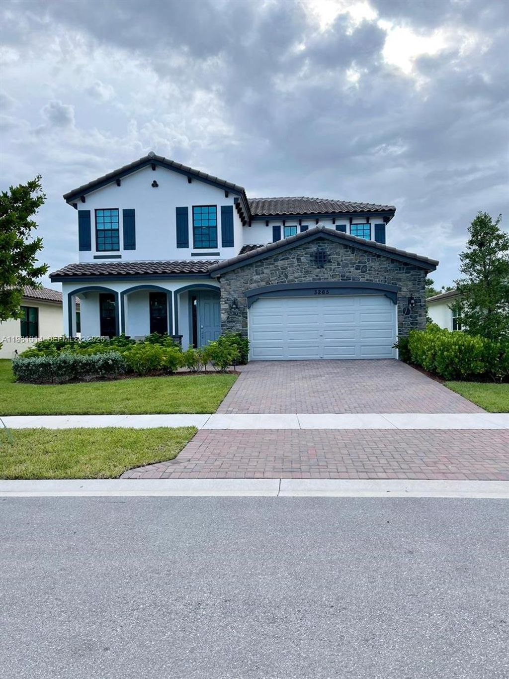 Photo of 3265 Dunning Dr, Royal Palm Beach, FL 33411 (MLS # A11981014)