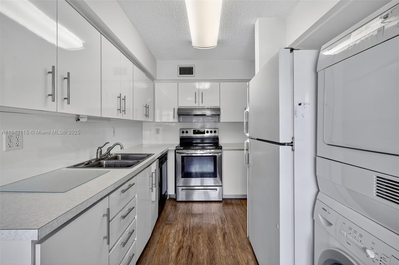 Wonderful 1st floor corner unit with parking right in front for your convenience. This well maintained property features an eat in kitchen, updated cabinets, newer stove, refrigerator, dishwasher, washer/dryer, and plenty of lighting. The spacious master bedroom can easily accommodate a King size bed, with a nice size master bathroom and walk in closet. The 2nd bedroom has a full bathroom with shower and closet. The living and dining area have vinyl waterproof flooring and lead to an enclosed porch with built ins for additional storage. There is also a nice tiled courtyard area in the back to enjoy the outdoor Florida weather. This well known community features wonderful amenities like clubhouse, tennis, public golf course, pool, fitness center & more. Amazing location in Delray Beach.