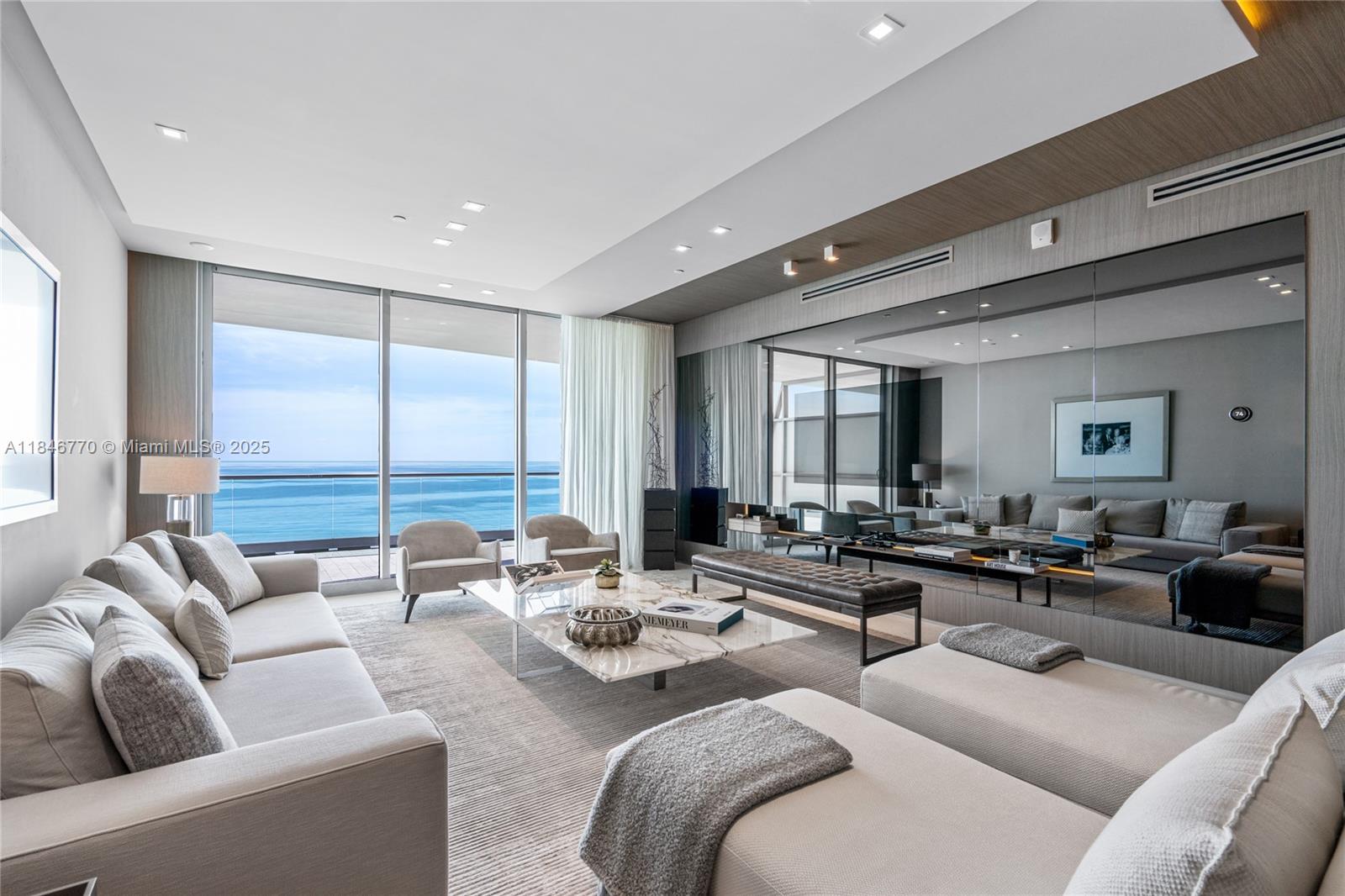 Experience luxury living at the exclusive Fendi Chateau in Surfside. This boutique condominium, with only 57 residences, boasts over 300 feet of stunning oceanfront. This residence offers a designer-decorated flow-through floor plan with 4 bedrooms and 4.5 bathrooms plus staff room, showcasing magnificent direct ocean views. Highlights include 10-foot ceilings and expansive terraces with eastern to western exposure. Residents enjoy unparalleled service and 5-star amenities, including two pools, a spa, a state-of-the-art gym, a private restaurant, a movie theater, beach service, concierge, barbecue, and a business center. The Fendi Chateau's prime location is within walking distance of Bal Harbour Shops, The Four Seasons Hotel, local restaurants, and houses of worship.