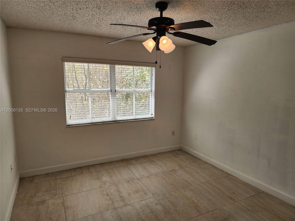 Photo of 2451 Centergate Dr #301, Miramar, FL 33025 (MLS # A12008135)