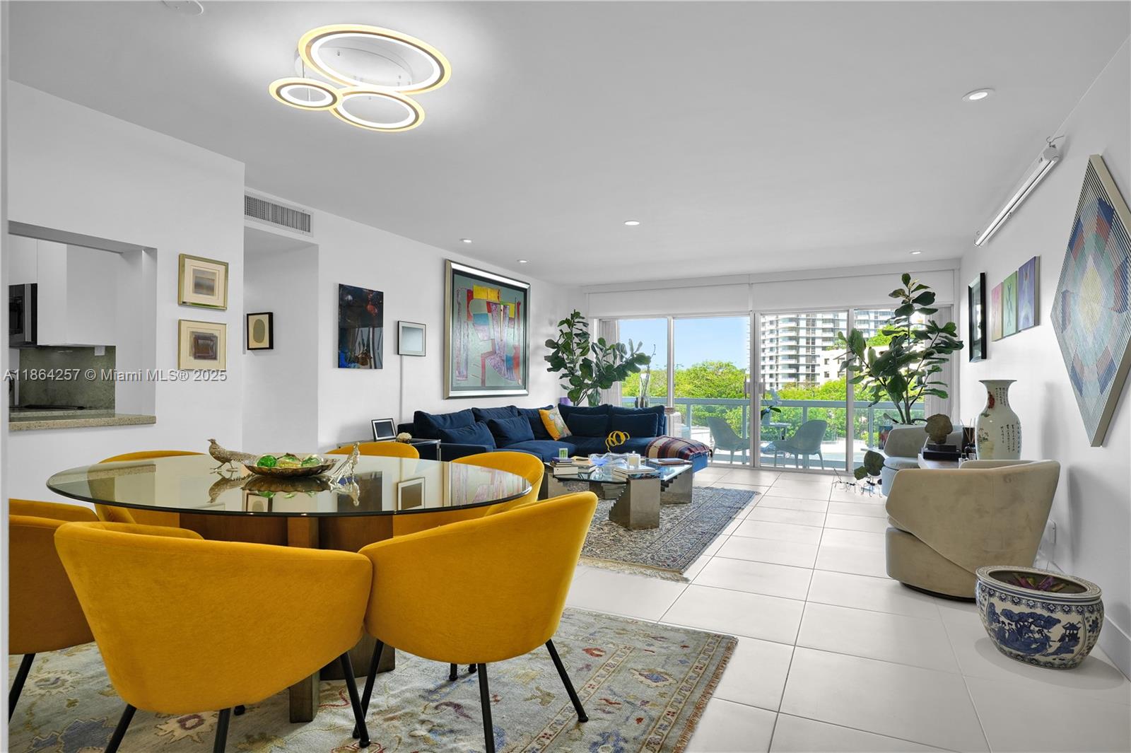 Stunningly renovated condo in the highly desirable Brickell Townhouse, a gated bayfront community set on an expansive 8-acres property along prestigious Brickell Avenue and an 8 minute walk to Hobie beach. This stylish unit features an updated kitchen, sleek porcelain floors, custom closets, and an in-unit washer and dryer. A spacious open balcony. Enjoy resort-style amenities including a fully equipped gym, oversized pool, 2 Jacuzzis, 2 tennis courts, basketball court, playground, library, community room, and a waterfront BBQ area. Rent includes high-speed internet, cable, hot water, A/C filter service, and one assigned parking space. Quiet Brickell location, minutes from top restaurants and shops. The unit feels like new.