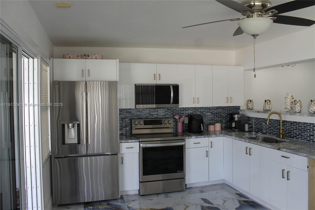 Photo of 3626 Victoria Dr, West Palm Beach, FL 33406 (MLS # A11812662)