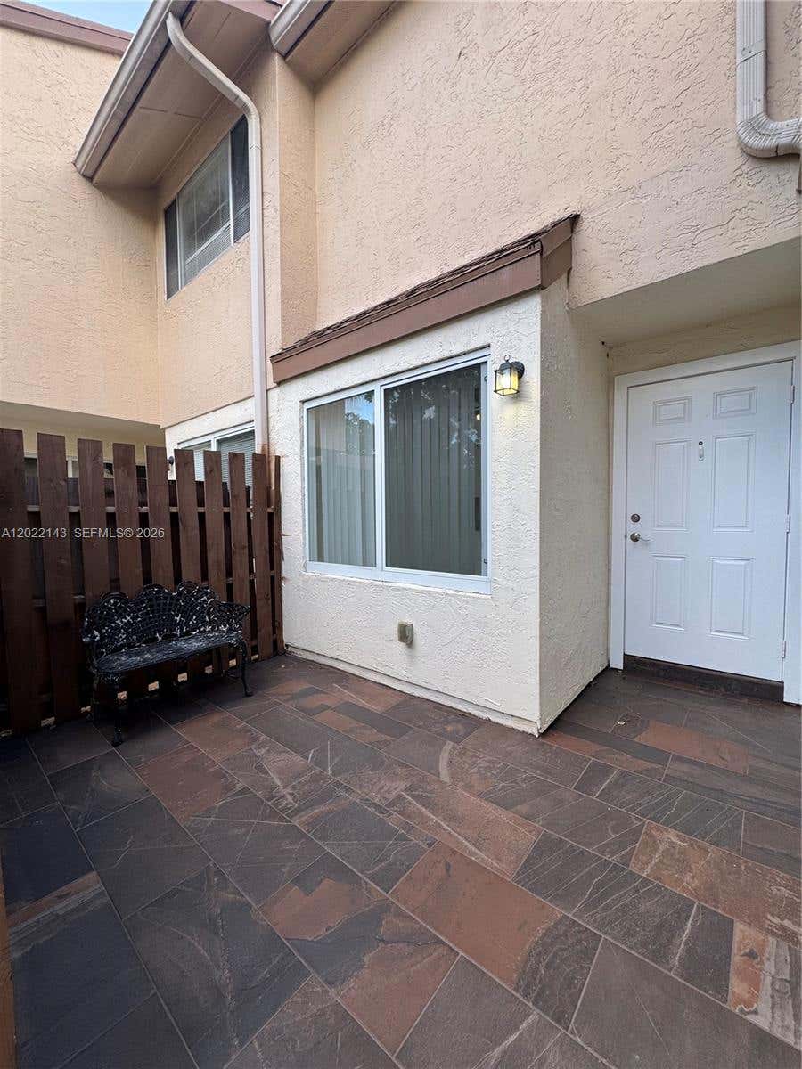 Photo of 8231 NW 8th Pl #3, Plantation, FL 33324 (MLS # A12022143)