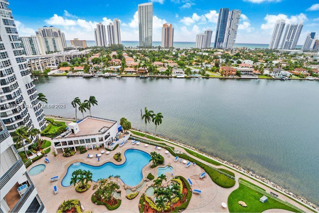 Discover the perfect waterfront condo in Aventura! This airy unit boasts an open floor plan with stunning bay views. Featuring a 2-bedroom split layout, both rooms offer amazing vistas. The kitchen has stainless steel appliances, an eat-in area, 5-star amenities gorgeous pools, and a modern gym, within walking distance of the beach. Enjoy the sunrise on your private balcony. Come explore Mystic Pointe's offerings!