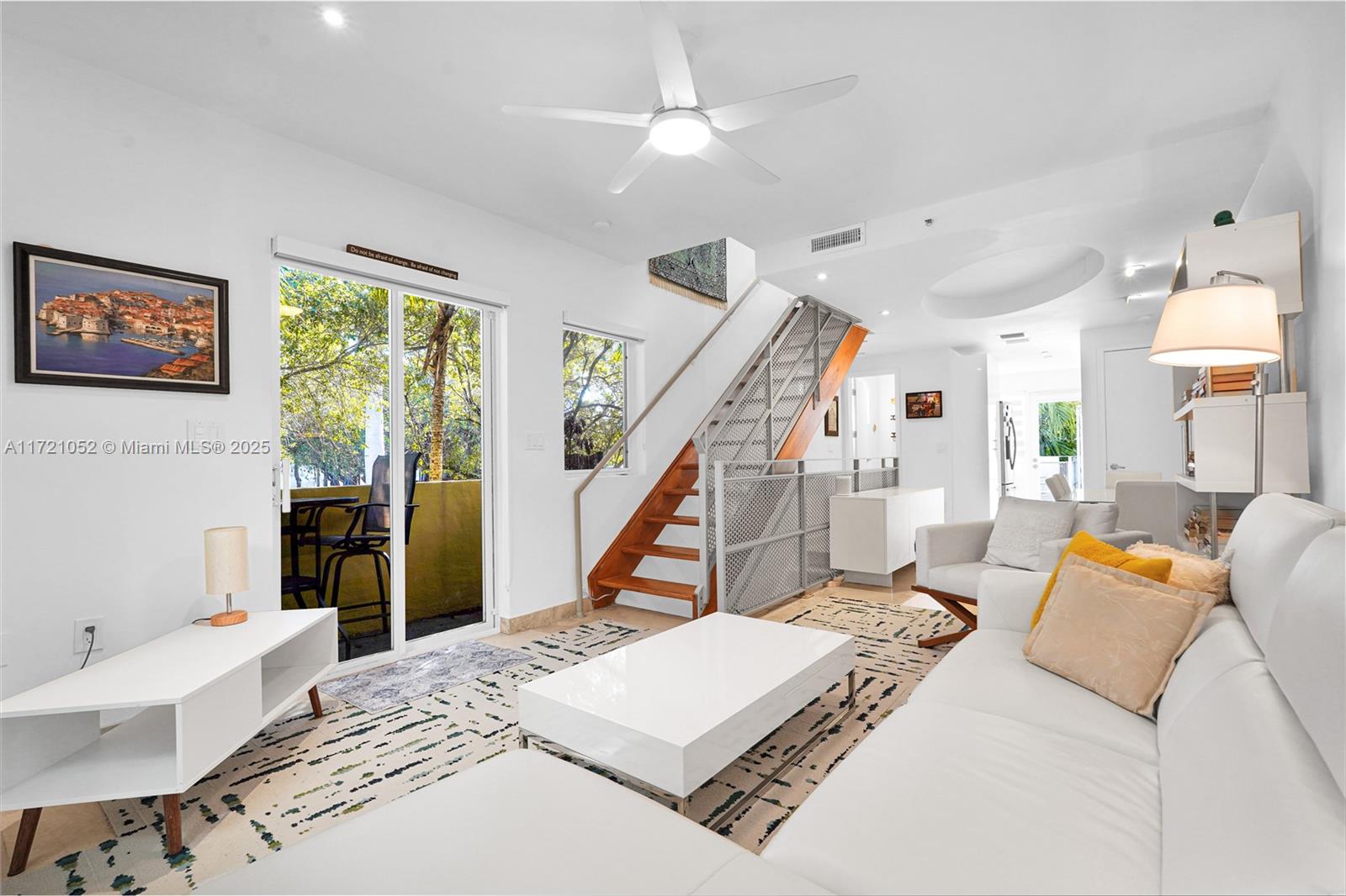 Experience elevated living in this beautifully renovated two-bedroom corner unit townhouse in the sought-after South of Fifth neighborhood. This prime location offers a vibrant lifestyle, just a few blocks from the beach, upscale dining, coffee shops, Flamingo Park, and more. The home features sleek stainless steel appliances, two private balconies, impact windows and doors, and the convenience of an in-unit washer and dryer. A converted garage provides versatile space, ideal as a third bedroom or additional living area. Available for a minimum six-month lease, this townhouse perfectly blends comfort and style in an unbeatable location.
