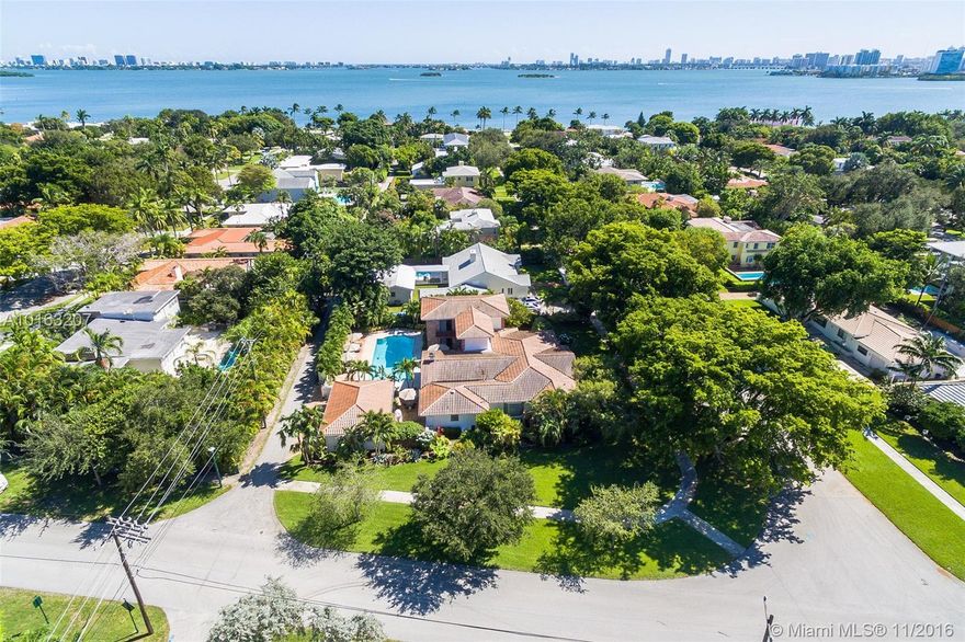 SPACIOUS FAMILY HOME IN PRIME MIAMI SHORES LOCATION ONE BLOCK FROM THE BAY. HOME SITS ON 0.4 ACRE LOT AND HAS OVER 5100 SQ. FEET OF LIVING AREA. 4 BEDS ON FIRST FLOOR & HUGE MASTER SUITE ON SECOND LEVEL. FORMAL DINING ROOM. LARGE LIVING ROOM. FAMILY ROOM OVERLOOKS PRIVATE POOL/PATIO. DETACHED 3 CAR GARAGE WITH ACCESS FROM SERVICE ALLEY. LARGE EAT-IN KITCHEN WITH EXTRA STORAGE SPACE. LAUNDRY ROOM. DUAL ZONE CENTRAL A/C. MANICURED FENCED YARD WITH SPRINKLER SYSTEM. TRULY A RARE FIND.