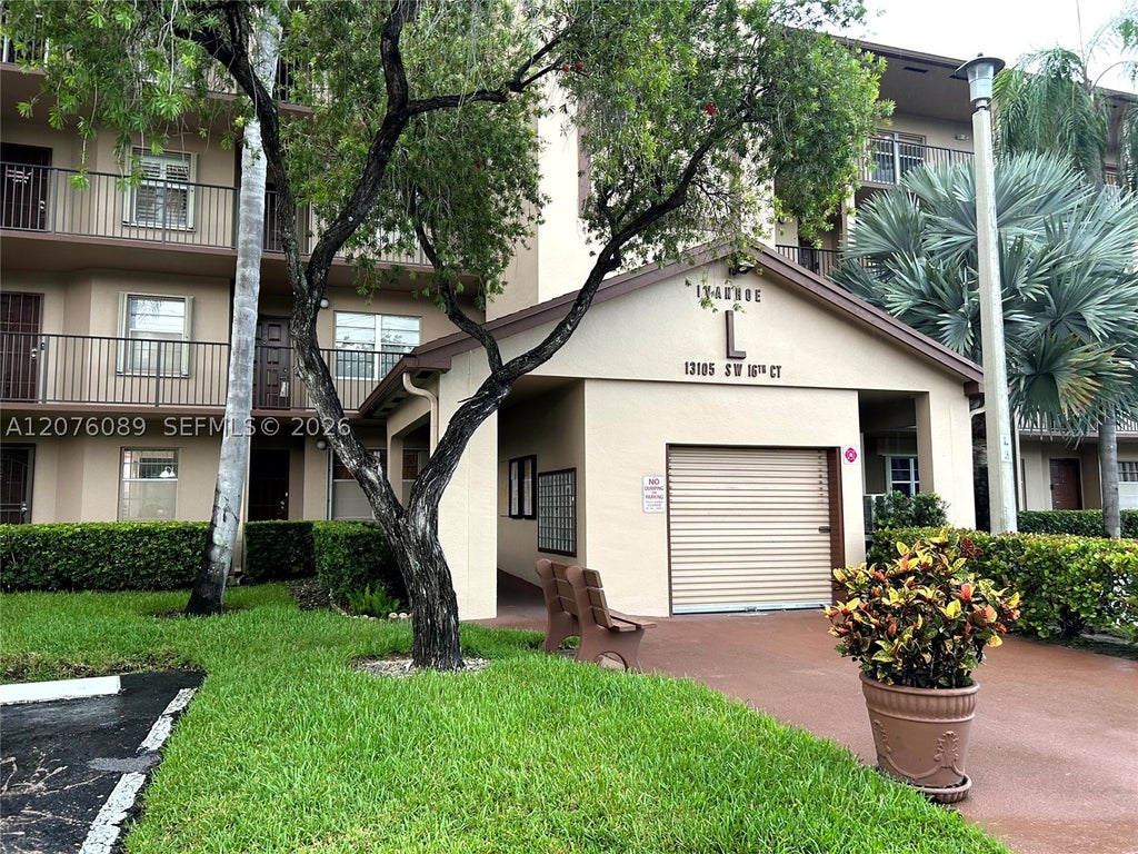 Photo of 13105 SW 16 Ct #105L, Pembroke Pines, FL 33027 (MLS # A12076089)