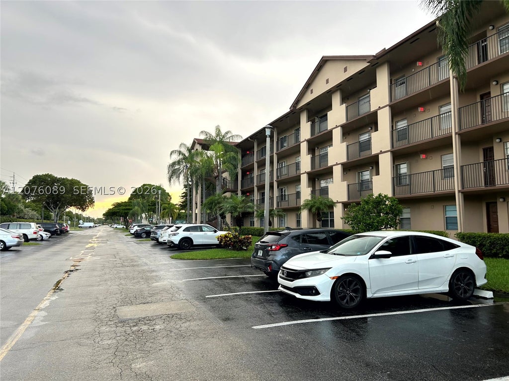 Photo of 13105 SW 16 Ct #105L, Pembroke Pines, FL 33027 (MLS # A12076089)