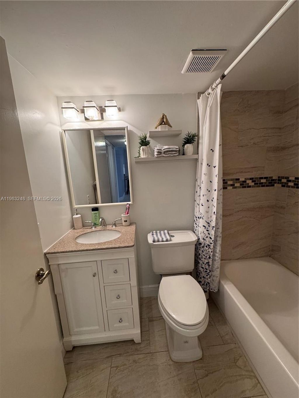 Photo of 6095 N Sabal Palm Blvd #104, Tamarac, FL 33319 (MLS # A11983248)