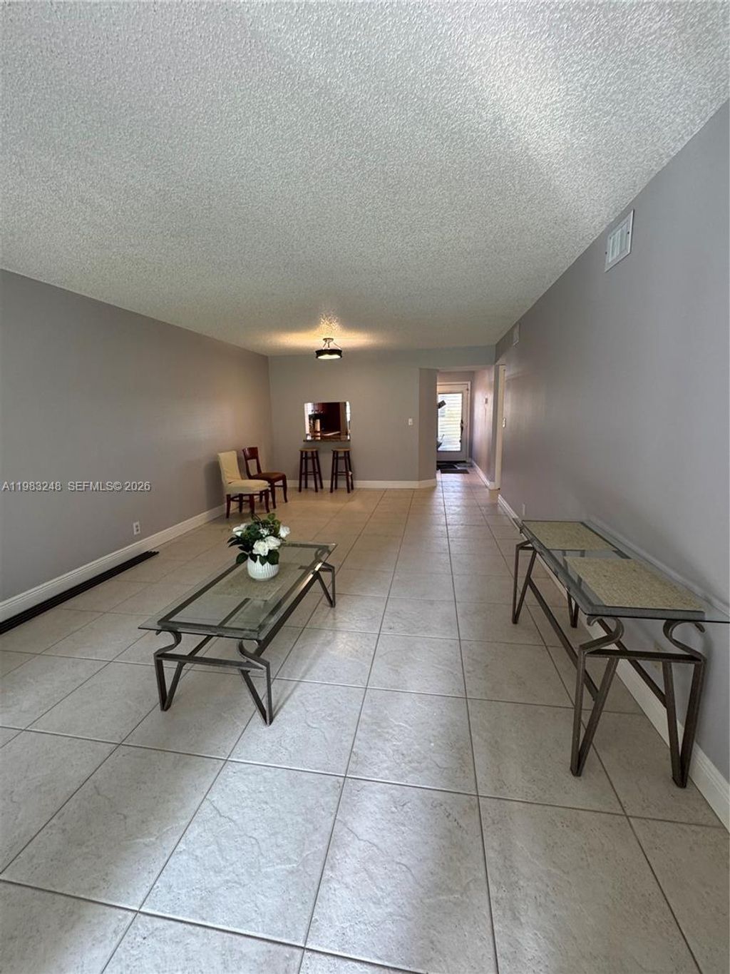 Photo of 6095 N Sabal Palm Blvd #104, Tamarac, FL 33319 (MLS # A11983248)
