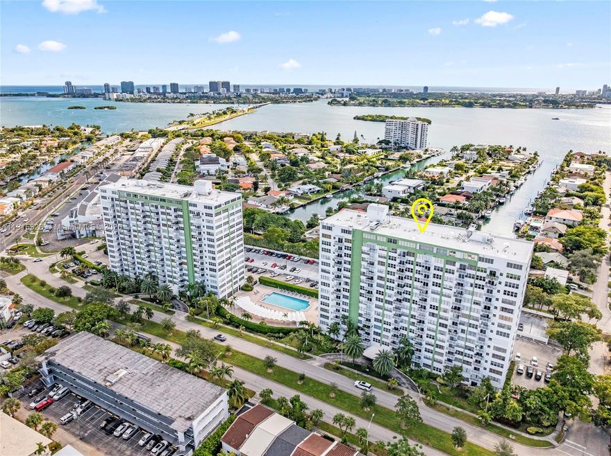 Beautifully updated 2-bedroom, 2-bath residence in highly desirable Sans Souci Estates, just minutes from the Beach &  Bal Harbour Shops. This spacious unit features over 1,188sqft of bright living space. Serene City & Water views from both bedrooms. The primary suite includes a walk-in closet. Upgraded  kitchen offers granite countertops, stainless-steel appliances, & a stylish backsplash. Additional highlights include hurricane shutters, newer A/C, and a tankless water heater. Enjoy resort-style amenities such as an Olympic-size heated pool, saunas, fitness center, library, lounge rooms, & in-house management. Maintenance covers high-speed internet, premium cable, water, sewer, pest control, & building insurance. Assigned parking & gated entry with ample guest parking.