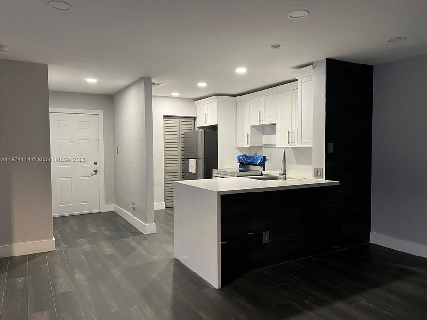 Beautiful, Modern Remodeled First floor, 2bed 2 bath unit. Excellent central location close to mall, highways, restaurants and entertainment. Stainless steel appliances, tankless water heater, front load newer washer and dryer, Newer floors, white Quartz waterfall countertops, sleek white cabinets, new toilets and upgraded bathrooms. Move in ready end of Sept. Remodeled clubhouse with a fully equipped fitness center, lounge, media center, pool and whirlpool spa, children's playground, tennis courts, gazebo and security patrol offer resort like living. Trash compactor on site, professionally managed and maintained! MUST SEE!