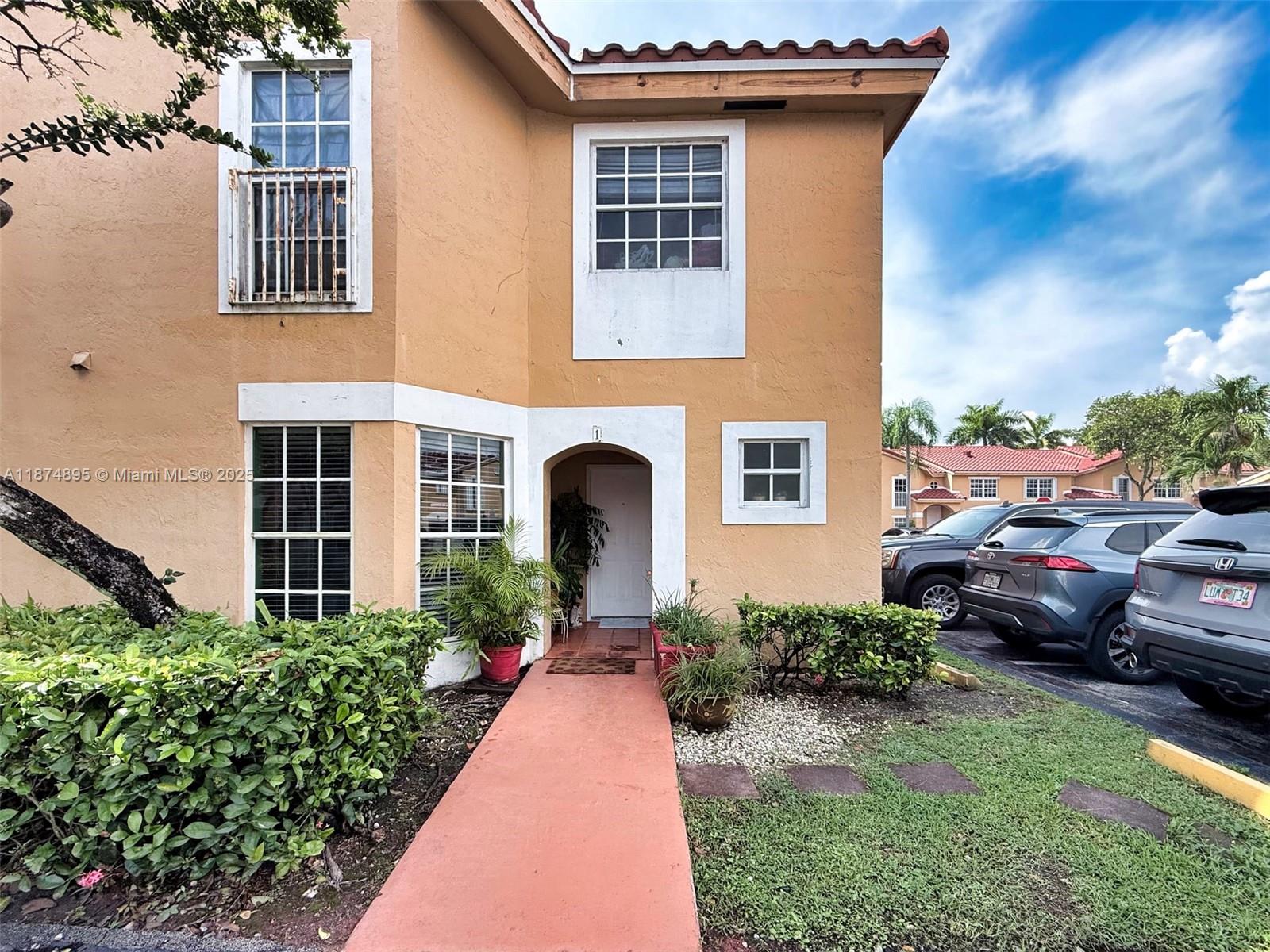 Natural light fills this inviting 3-bedroom, 2.5-bath corner townhouse in Kendall, highlighting thoughtful updates and the unique character of each space. The renovated kitchen features modern cabinetry, stainless steel appliances, and stylish finishes. Each room is painted in a distinct color, adding personality and purpose. Upstairs, the spacious primary suite offers a quiet retreat with a walk-in closet, while two additional bedrooms provide flexibility for family, guests, or office space. Located across from the Miccosukee Golf & Country Club in a quiet, well-kept community, this home offers low HOA fees covering water and insurance, combining comfort, charm, and convenience near schools, shopping, dining, and major highways.