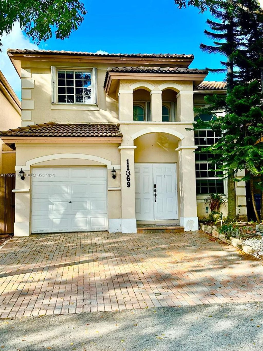 Photo of 11369 NW 73rd Ter #11369, Doral, FL 33178 (MLS # A11994153)