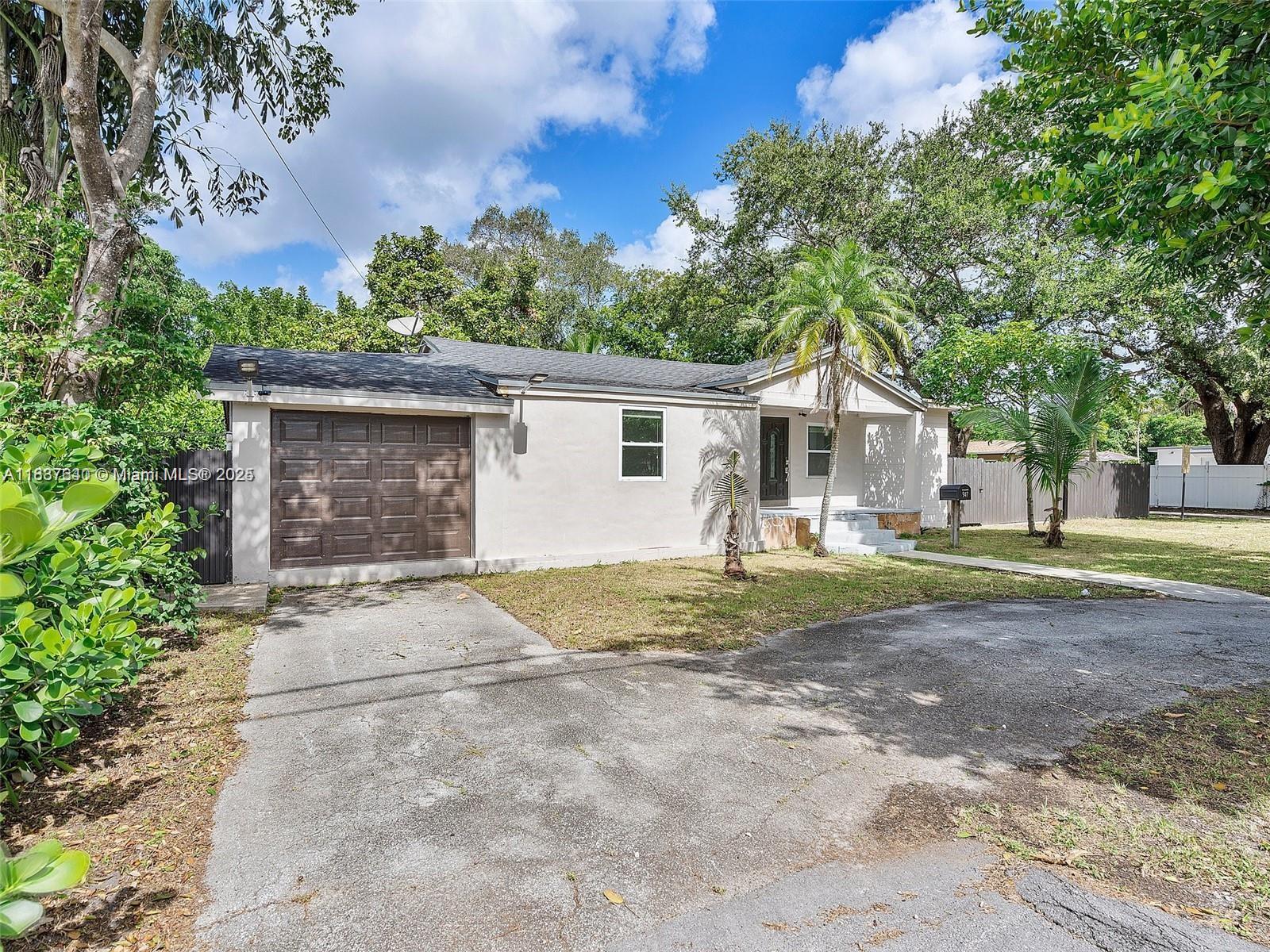 Great for a large family, ALL INCLUDED WITH RENT. ALL. 3 full units in one. Also can rent separately, furnished 4B 4B. Divided two unit home with the main home being a 2 bed, 2 bath and a large side unit 1 bed, 1 bath. The second unit in the rear of the property is a spacious 1 bed, 1.5 bath. Great set up for year round rentals. It sits in a magnificent corner lot with just over 14,000sqft and beautiful mature trees offering you the shade needed to enjoy Miami's weather. The master bathroom has been beautifully updated with a modern tub, separate shower and modern fixtures. The lot can be accessed through the front or the back both from a pedestrian gate or an electric gate for your vehicles. The large lot offers plenty of additional parking or enough yard space.