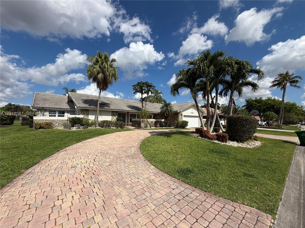 Photo of 404 NW 112th Ave, Coral Springs, FL 33071 (MLS # A12010387)