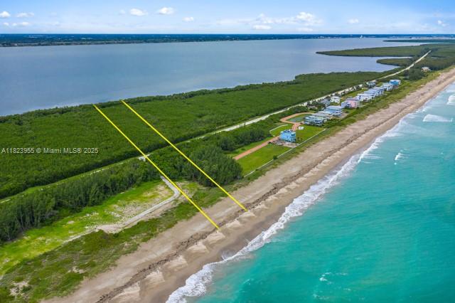Welcome to Whalesong...an oceanfront estate lot that stretches from the Atlantic Ocean to the intracoastal. No HOA! 86 feet of ocean frontage, 2.69 acres of land. Future riverfront dockage available. Your own private entry from State Road A1A. Permitted and ready to build your dream home. Breath-taking sunrises and stunning sunsets await you… Don’t miss your chance to own a little slice of paradise here on Hutchinson Island. Just a short distance to South Beach & Downtown Fort Pierce.