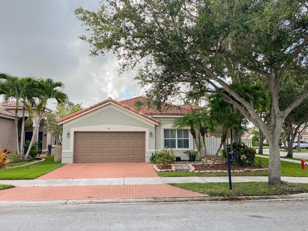 Discover your South Florida dream home in the vibrant city of Weston. This charming single-story residence boasts numerous upgrades, including a new roof installed in 2019. The kitchen features premium appliances, granite countertops, and a stylish backsplash, complemented by a cozy eat-in area. There's also an additional bonus room, perfect for use as an office. The outdoor space is equally impressive, with a backyard patio equipped with a high-end BBQ setup, wood deck, fire pit, and a delightful garden for growing your own vegetables. Located in a top-rated school district, Weston was ranked No. 8 on Money Magazine's list of "Top 10 Best Places to Live in America" in 2016. The Meadows offers a pool, park, and sports courts and more.