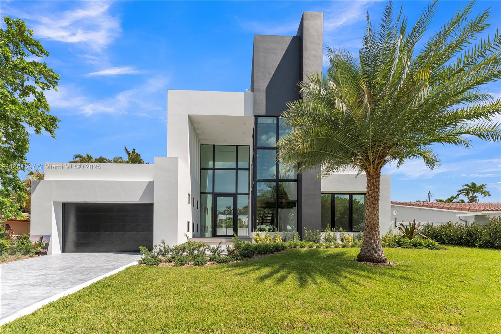 Step into modern elegance with this newly built Pompano Beach home, designed for today’s lifestyle. Featuring open, sunlit living spaces, high-end finishes, and a sleek chef’s kitchen, this residence blends comfort and sophistication. The primary suite offers a private retreat with a spa-inspired bath, while generous secondary bedrooms provide flexibility for family or guests. Perfect for entertaining, the home flows seamlessly to an outdoor area ideal for dining or relaxation. Just minutes from pristine beaches, vibrant dining, and shopping, this property delivers the best of coastal South Florida living. Move-in ready and crafted for those who value style, convenience, and quality.