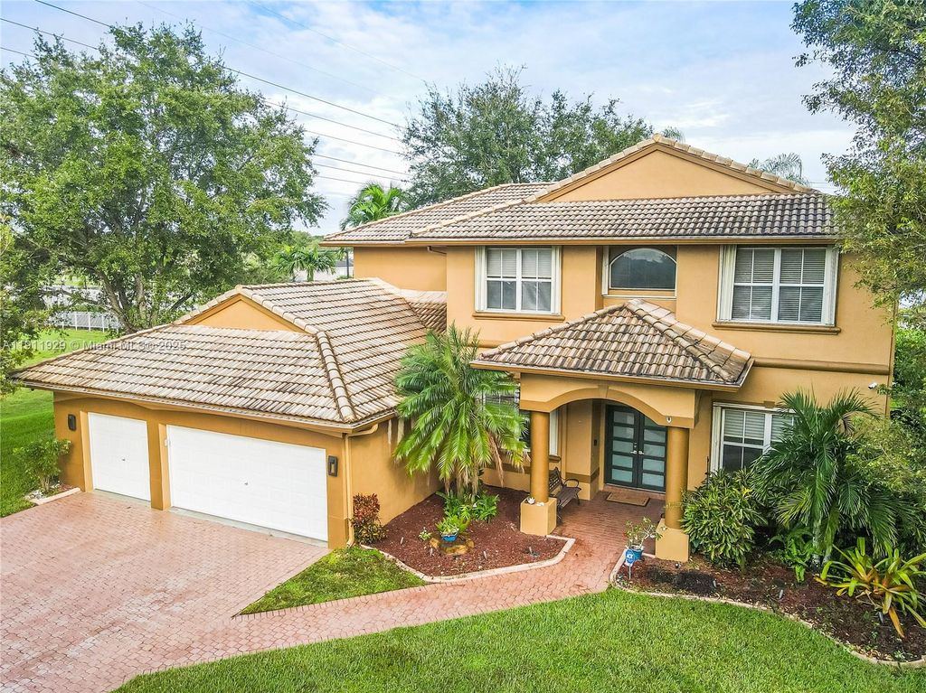 Photo of 15841 SW 61st St #15841, Davie, FL 33331 (MLS # A11911929)