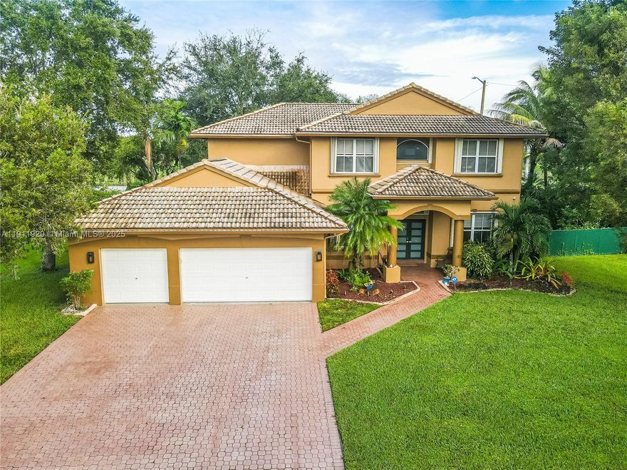 Stunning home in the gated community of The Enclave.  THis bright residence feathers an open floor plan with 5 bedrooms, 3 full bathrooms, 3 car garage, along with an expansive driveway for additional parking.  One full bedroom and bath on first floor, while the luxurious owners suite boasts a new newly renovated bathroom.  Additional bathrooms renovated in 2021, new upstars a/c July 2024, Downstaris a/c approx 2021, tankless water heater 2021.  Impact Front door, first floor porcelain floring all 2021.  Full house accordion shutters.  Second Floor and stairs Wood Floors.  Excellent area, Top Rated School District.  Area Parks, near everything!!   Assoc approval required, minimum credit 670+ clean background check.  30 day approval required, application fee $150 per adult.