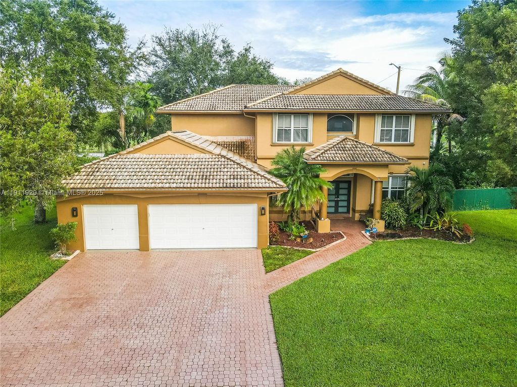 Photo of 15841 SW 61st St #15841, Davie, FL 33331 (MLS # A11911929)