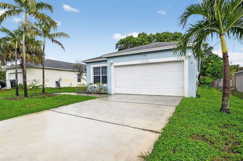 Photo of 1729 N 11th Ave N, Lake Worth, FL 33460 (MLS # A11893423)