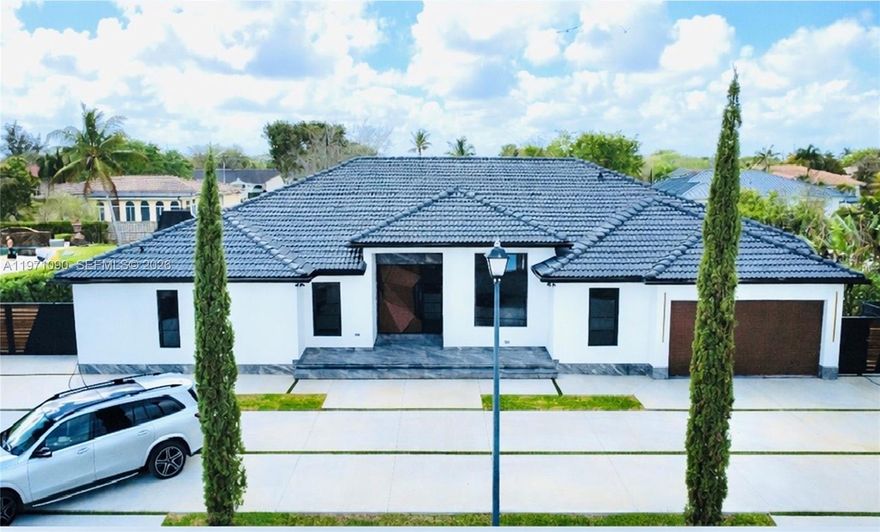 Modern Miami House finished for the most demanding user. Enjoy luxury home's features in this beautifully designed house. Large lot and Interior sq ft area with 5 bedrooms 3.5 baths. Solid build with attention to details in every aspect. Large 40x20 pool with lots of entertainment area and a spa for 8 people. You like quality, you like modern and lot of space, this is your opportunity. The kitchen as the rest of the house is a piece of art and is very big and modern. 48x48 Spanish tile in this 1 level single family house with No HOA and located in one of the most desirable neighborhoods in the area. Owner Agent