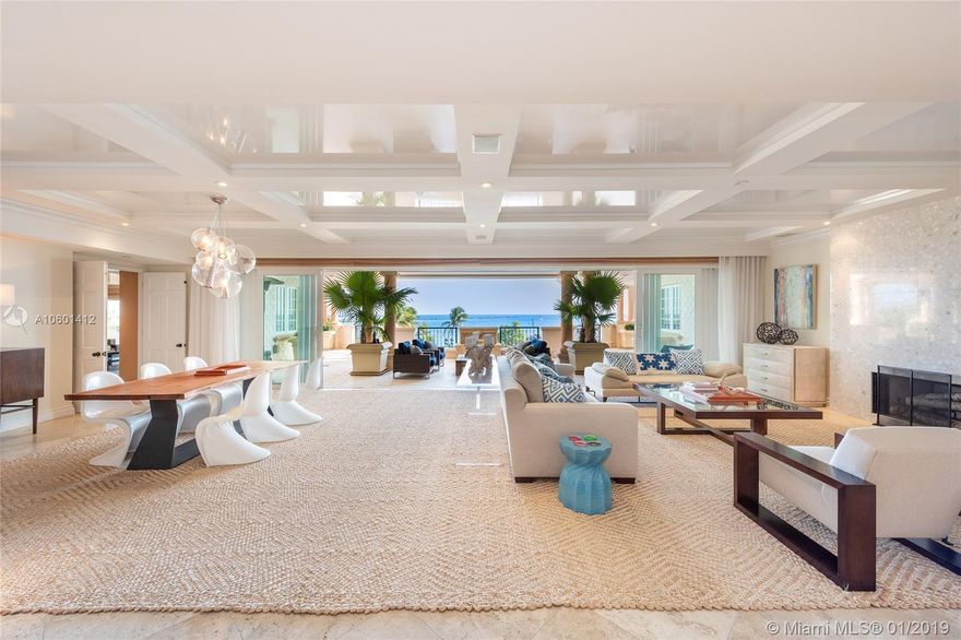 This contemporary Oceanside corner unit sits as the coveted tip of Fisher Island w/unobstructed sunrise views to Government Cut, ocean, beach & Miami Beach. The 5BR/6+2BA unit boasts 6,820 SF of interior space w/beautiful Travertine marble floors, open dining & living room layout w/a fireplace & walls of glass that open to endless ocean views. The gourmet kitchen sports top of the line appliances & a separate breakfast area & the large family/media room is ideal for relaxing & entertaining. The Oceanside principal suite is amazing w/direct ocean views, separate dual baths each w/voluminous walk-in closets. The other 4 bedrooms each w/en-suite baths. Watch the parade of cruise ships from your expansive wraparound terrace w/multiple seating areas to relax & enjoy the ocean views.