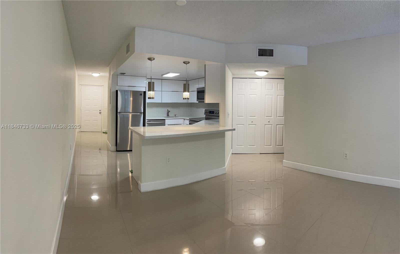 Beautifully updated and spacious 2 bedroom, 2 bath condo available for immediate rent in the highly sought-after community of Las Vistas at Doral. This bright and inviting unit features a remodeled kitchen with sleek cabinetry, quartz countertops, and stainless steel appliances. Both bathrooms have been tastefully updated with modern finishes for a clean, contemporary feel. Enjoy tile flooring throughout, a split-bedroom layout for added privacy, generous closet space, and the convenience of an in-unit washer and dryer. Relax on your private balcony with storage or take advantage of the gated community’s excellent amenities. Ideally located close to shopping, dining, and major highways. Move-in ready – don’t miss this opportunity!