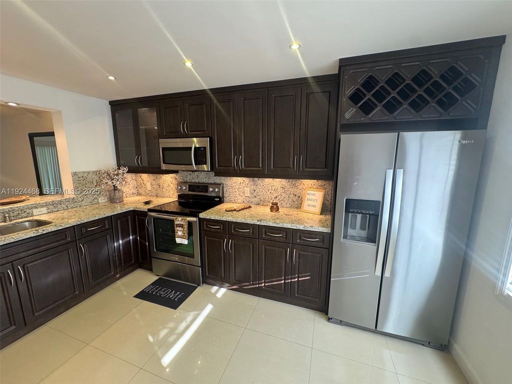 Photo of 13001 SW 15th Ct #207T, Pembroke Pines, FL 33027 (MLS # A11924468)