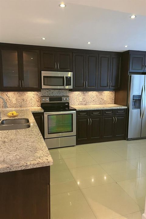 Photo of 13001 SW 15th Ct #207T, Pembroke Pines, FL 33027 (MLS # A11924468)