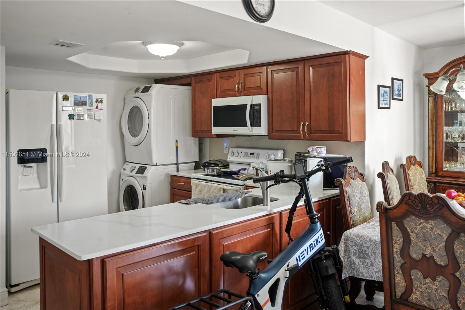 Welcome to your dream home! This tastefully remodeled 2-bedroom, 2-bathroom apartment combines tasteful elegance with ultimate comfort. Step into a spacious living area featuring tile floors and abundant natural light. The gourmet kitchen boasts a quartz countertops, and wood cabinetry as well as your in unit washer and dryer. Both bedrooms offer ample closet space and serene atmospheres. The luxurious bathrooms are fitted with contemporary fixtures and taste of modern living. Don't forget about your spacious private balcony! Conveniently located near shopping, dining, and public transport. This gem is a perfect blend of style and convenience.