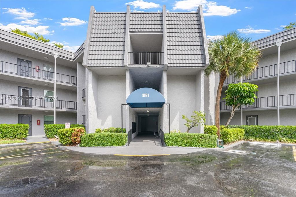 Photo of 9091 Lime Bay Blvd #304, Tamarac, FL 33321 (MLS # A12023496)